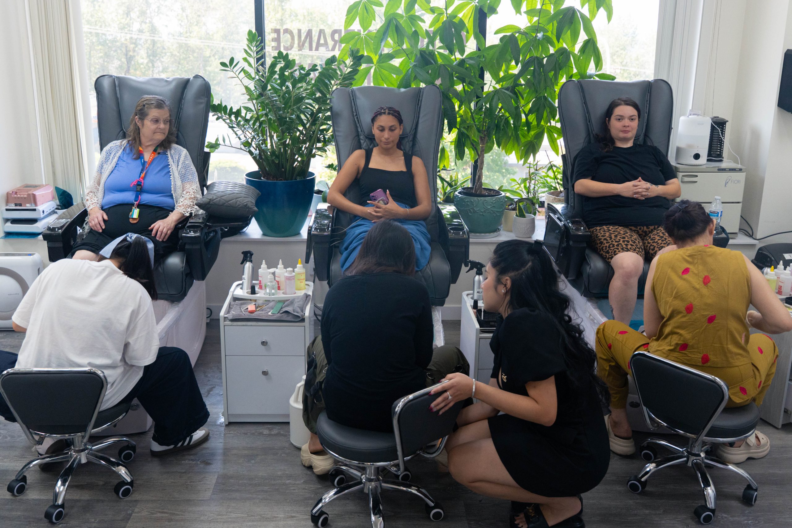 Barbering students at Katie Beauty Academy